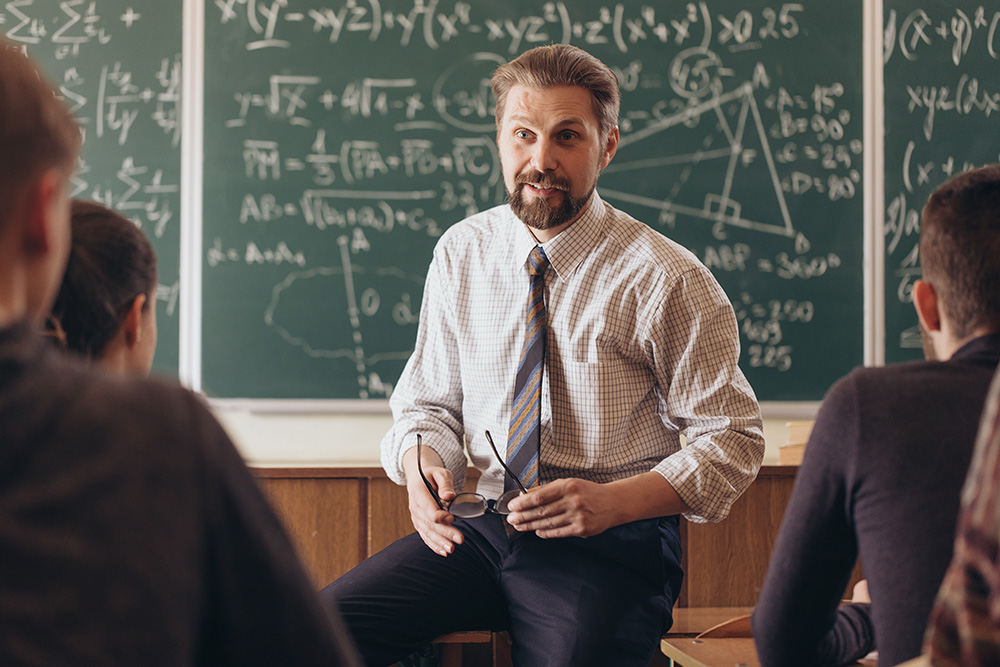 Professor having a conversation with students